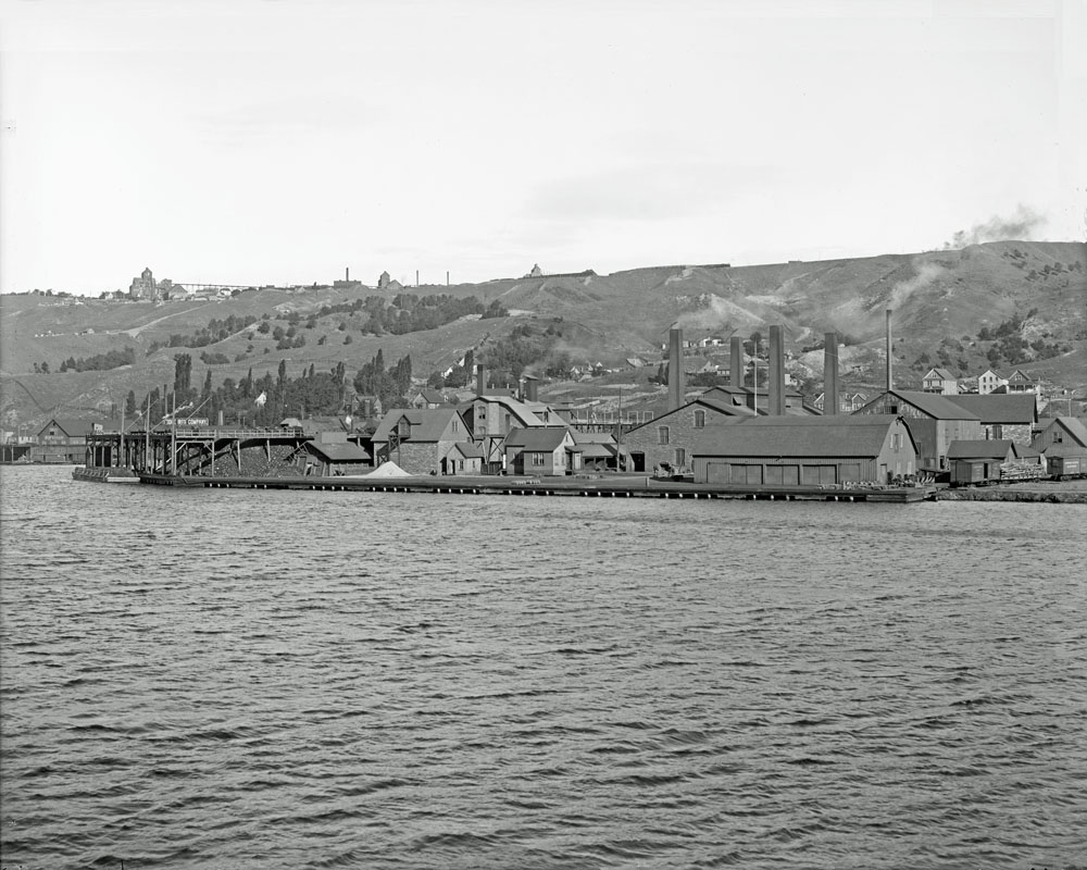 The Quincy Mining Company Smelter was built in 1898, in what is now called Ripley, in Franklin Township, on a site formerly occupied by the Pewabic Mining Company. (Quincy had taken over Pewabic Mining in 1891). Copper mineral for smelting was provided by the Quincy #1 Mill on Torch Lake, 6 miles to the East (and a few years later by the Quincy No. 2 Mill, adjacent to the No. 1 Mill). Originally, smelting operations were done at a site at the foot of Reservation St., in Hancock, which was fed by an incline tramway from the Mines atop Quincy Hill.