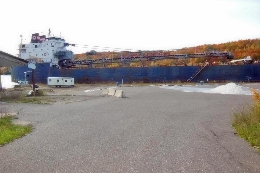 The Canadian freighter Algolake arrived in Hancock the second Sunday in October to deliver our winter's supply of road salt, shown here just arriving and leaving off ground personnel.