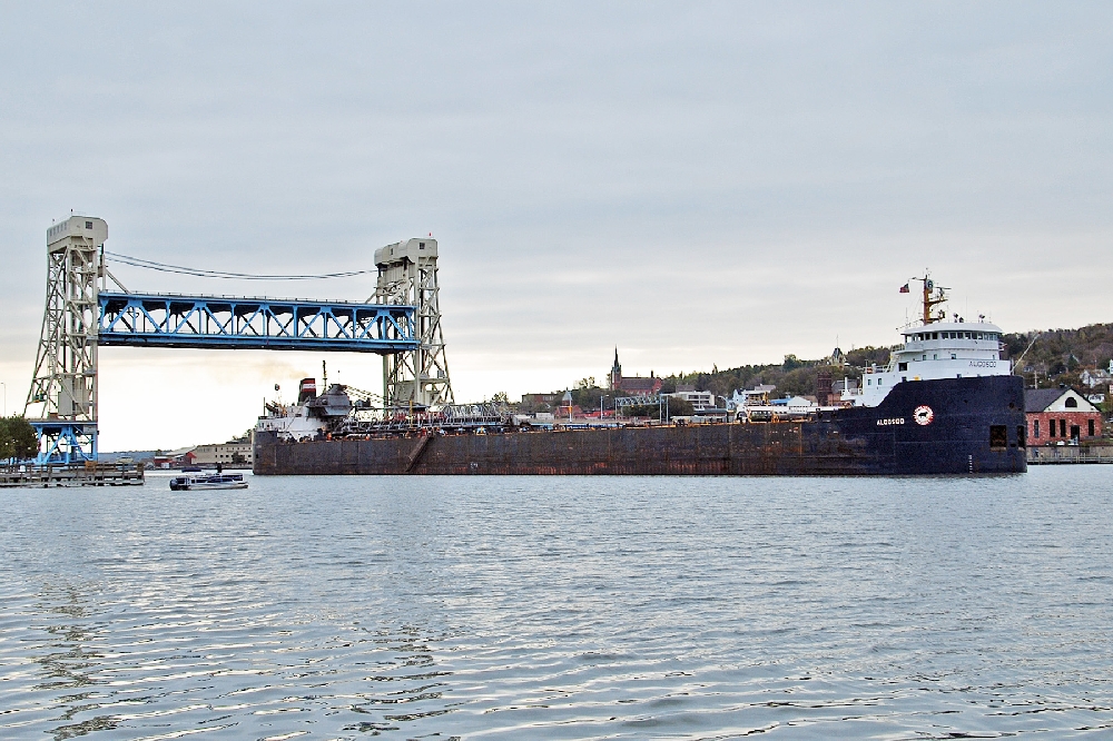 As the name implies, this Celebration is about the Portage Lake Lift Bridge, and our Bridge photo this year is of the passage of the Canadian Lake freighter Algosoo, bringing into Hancock a load of salt last Fall for our winter roads in the central and western U.P.