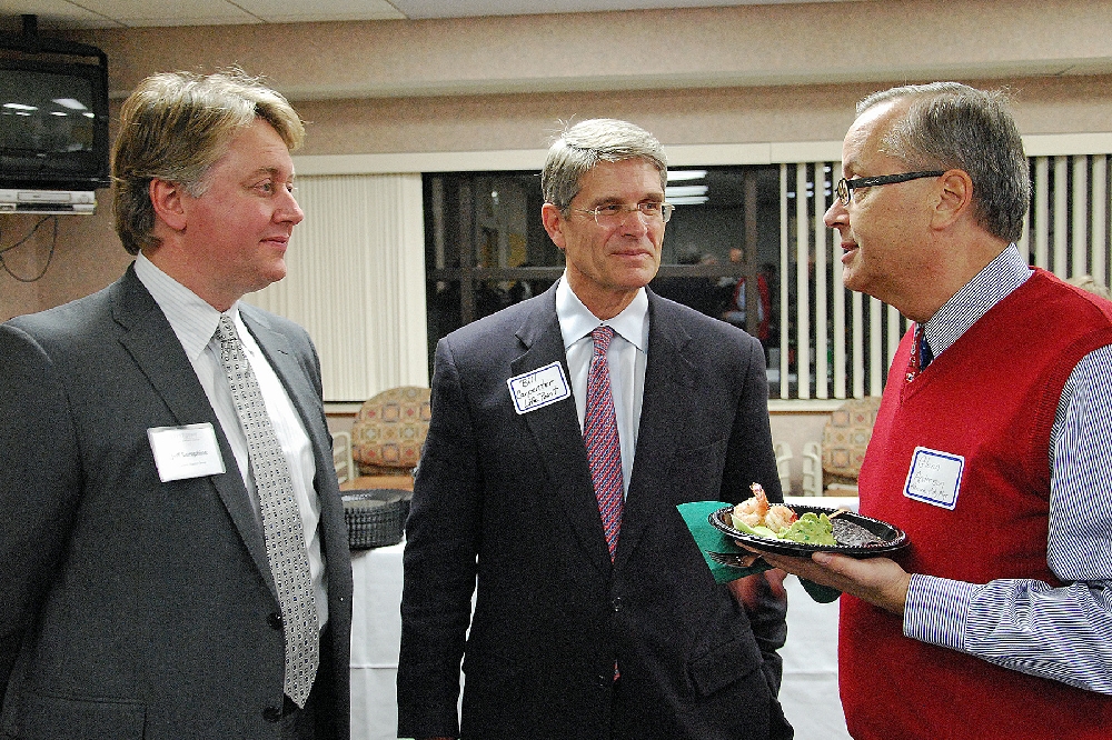 (L) Jeff Seraphine, CEO of LifePoint�s Eastern Division; Bill Carpenter, LifePoint CEO; and Hancock�s City Manager Glenn Anderson, chat before the announcements began.