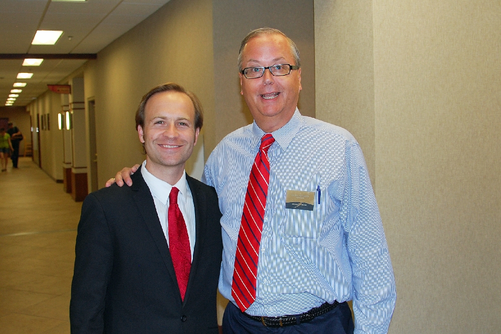 Lt. Governor Calley (L) is welcomed by Hancock�s City Manager Glenn Anderson.