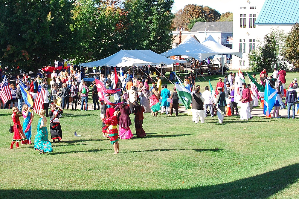 Many of the participants gather in the Quincy Green area of Finlandia University, in downtown Hancock, to line up in order for the Parade.