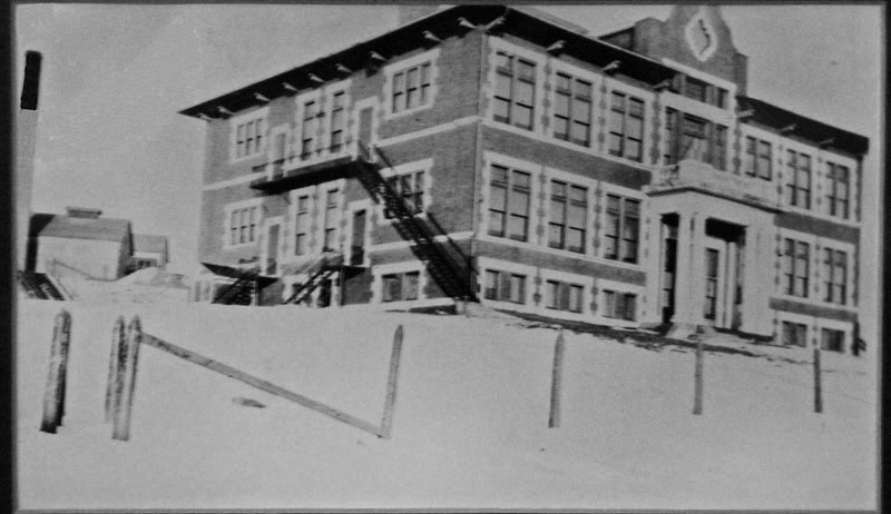 The former E.L.Wright Elementary School, on North Lincoln Drive, recently celebrated it�s 100th Anniversary.  The building was constructed and opened in 1910. This photo appears to have been taken in the early 1910's, during the winter. [ Photo courtesy-E.L.Wright Bldg.].